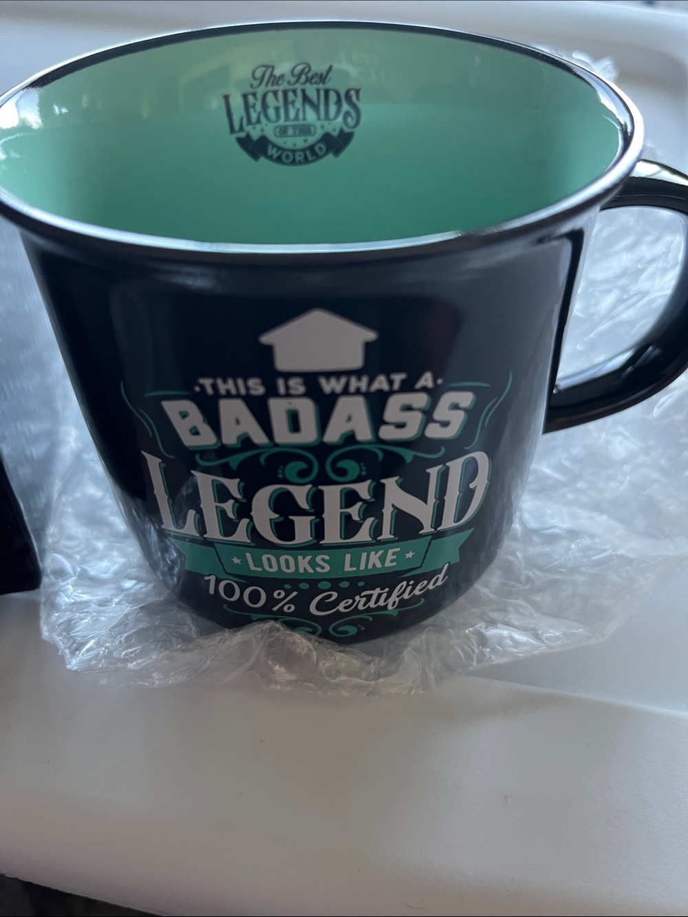 NIB “This is what a badass legend looks like” mug